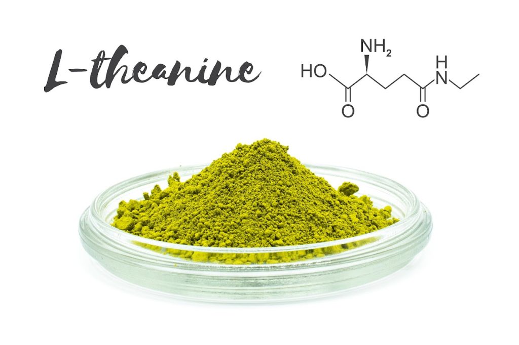 L-Theanine molecule formula with green powder made from tee leaves.